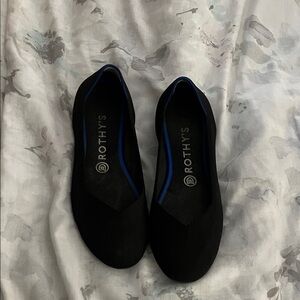 Rothy's Elegant Black Flats with Blue Trim